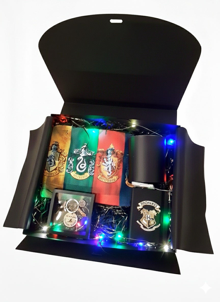 Caja negra de regalo con artículos y accesorios con diseño de Harry Potter y luces led de colores.