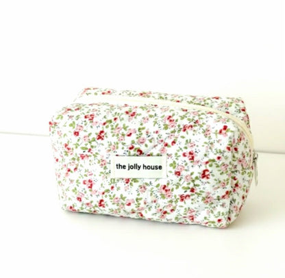 Neceser octagonal, con estampado floral y cierre de cremallera para mujer.